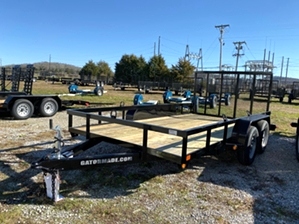 Utility Trailer Tandem By Gator 14ft  Utility Trailer Tandem By Gator 14ft. Dual Axle trailer with treated wood floor, powder coat finish, and spring assisted tailgate. 